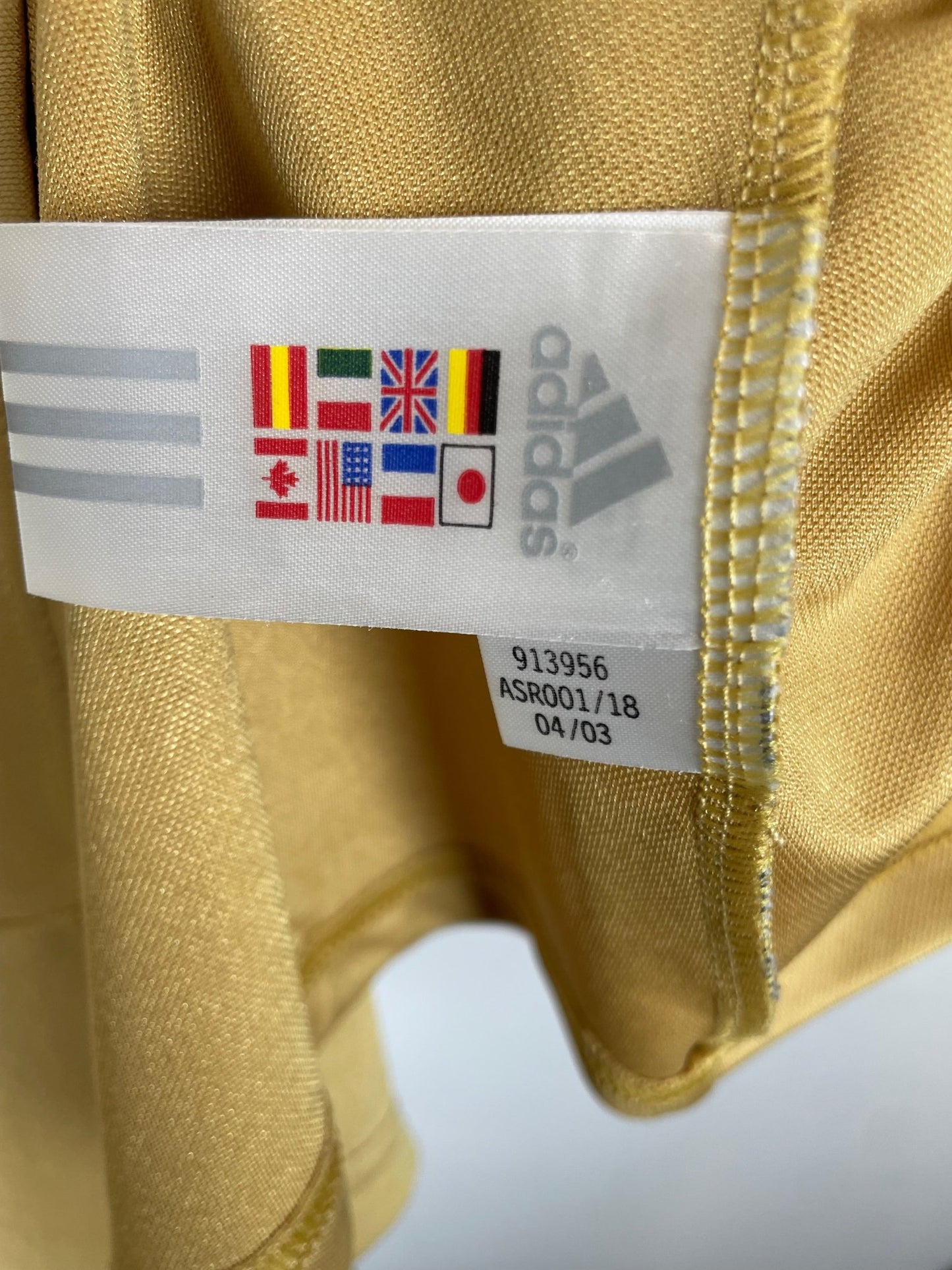 Close-up of the Benfica club crest and Adidas logo on the 04/05 third kit with shorts, detail shot from our store