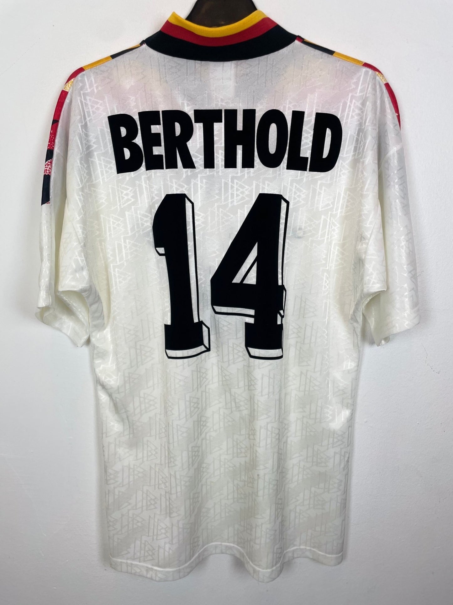 Front view of the iconic Germany 1994 home shirt showing the DFB crest and Adidas stripes, shown in full front detail
