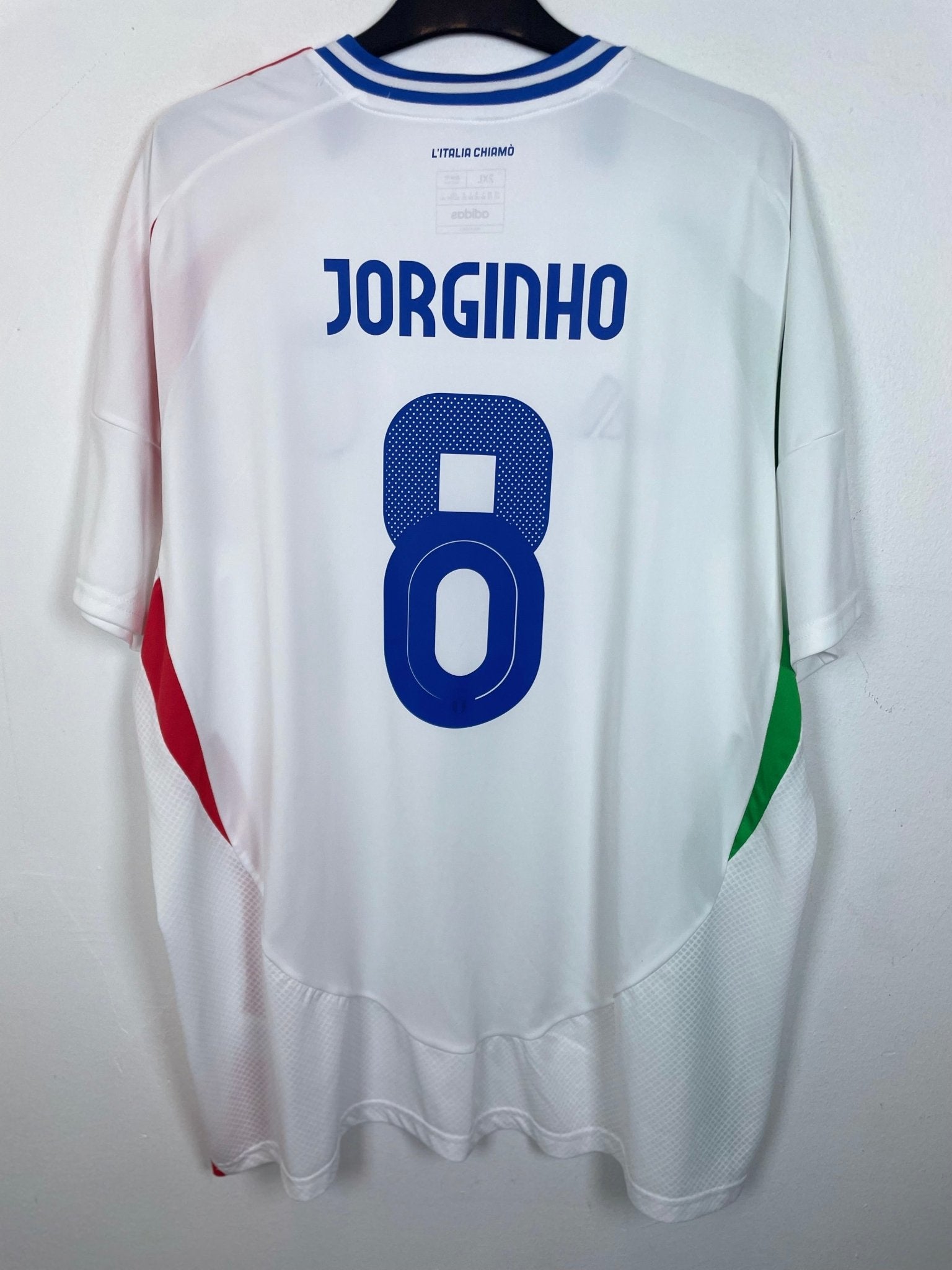 Front view of the Italy 24/25 away shirt showing the national badge and Adidas three stripes, shown in full front detail