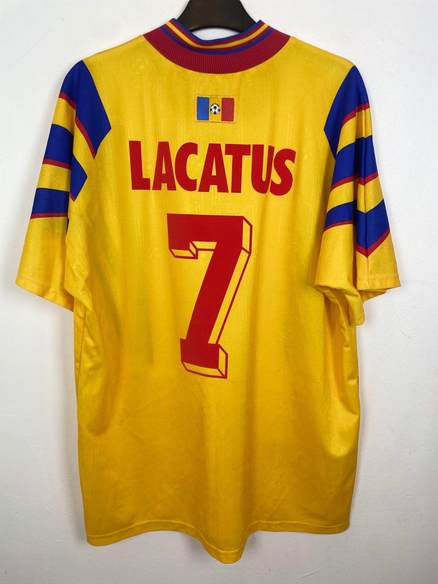 Front view of the retro Romania 1996 home shirt showing the badge and Adidas three stripes, shown in full front detail