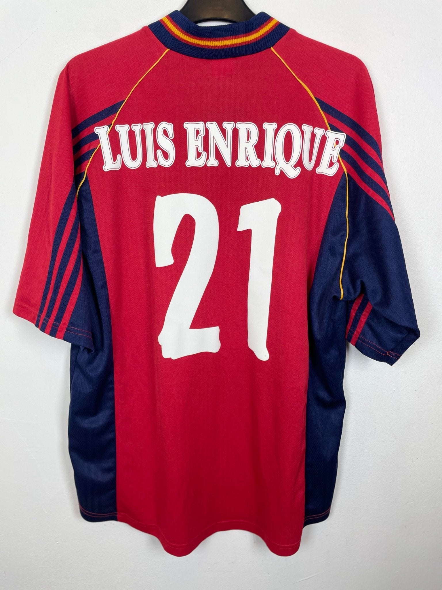 Front view of the retro Spain 1998 home shirt showing the national crest and Adidas stripes, shown in full front detail