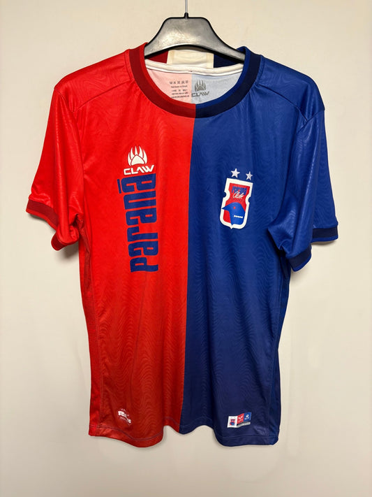 Front view of the Claw Paraná 2024 home shirt showing the club badge and sponsor print detail