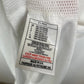 Close-up of the Rangers club crest and Nike logo on the 01/02 away football shirt, shown in close detail from Norway