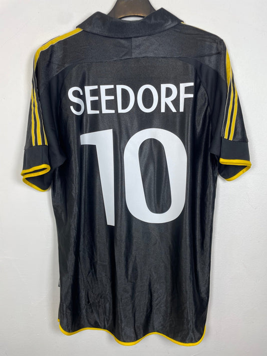 Front view of the retro Real Madrid 99/00 away shirt showing the badge and Adidas branding, shown in full front detail