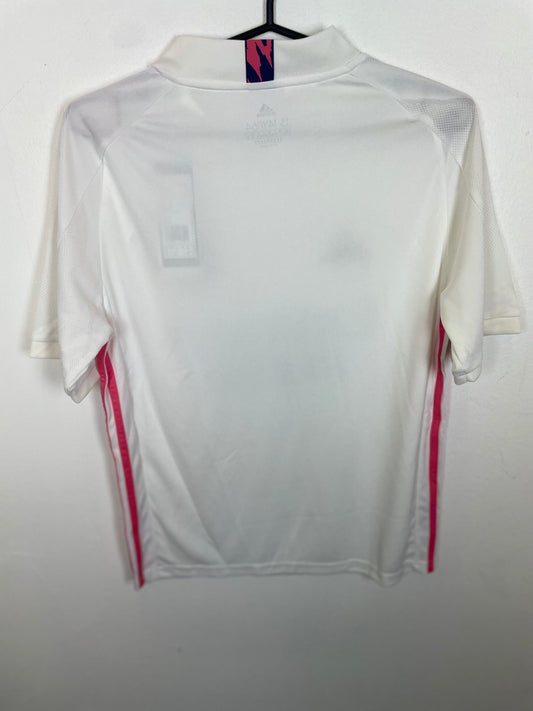 Front view of the Real Madrid 20/21 kids home shirt showing the club crest and sponsor, photographed at our Stavanger store