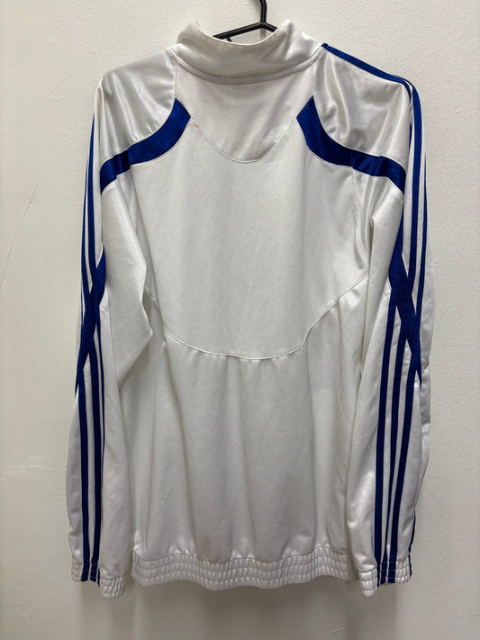Front view of the Real Madrid track jacket showing the Los Blancos badge and Adidas stripes, shown in full front detail