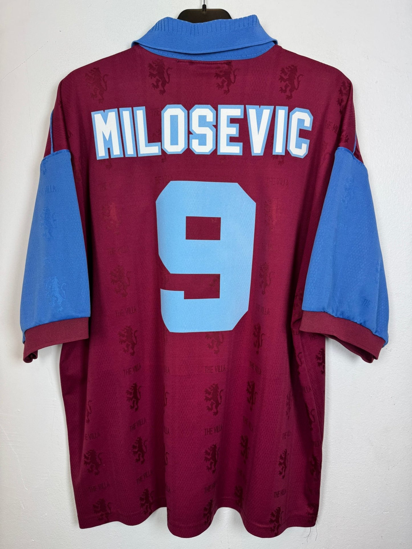 Front view of the retro Aston Villa 95/97 home shirt showing the crest and Reebok branding, shown in full front detail
