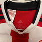 Back of the Sheffield United 2019/20 striped youth home shirt without nameset, photographed against a plain background