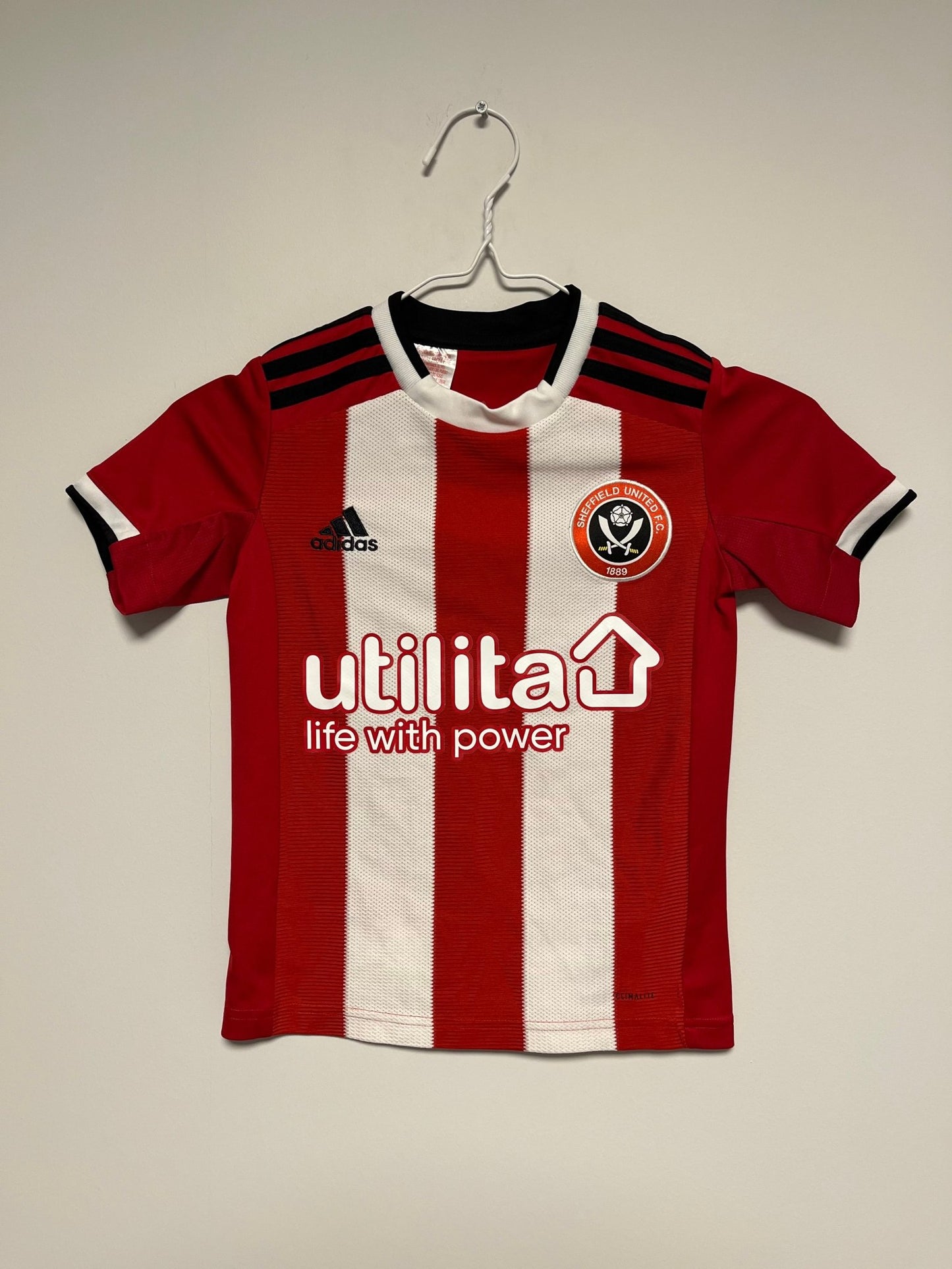 Official Sheffield United 2019/20 home shirt in red and white stripes, kids size 7-8 years, genuine original football shirt