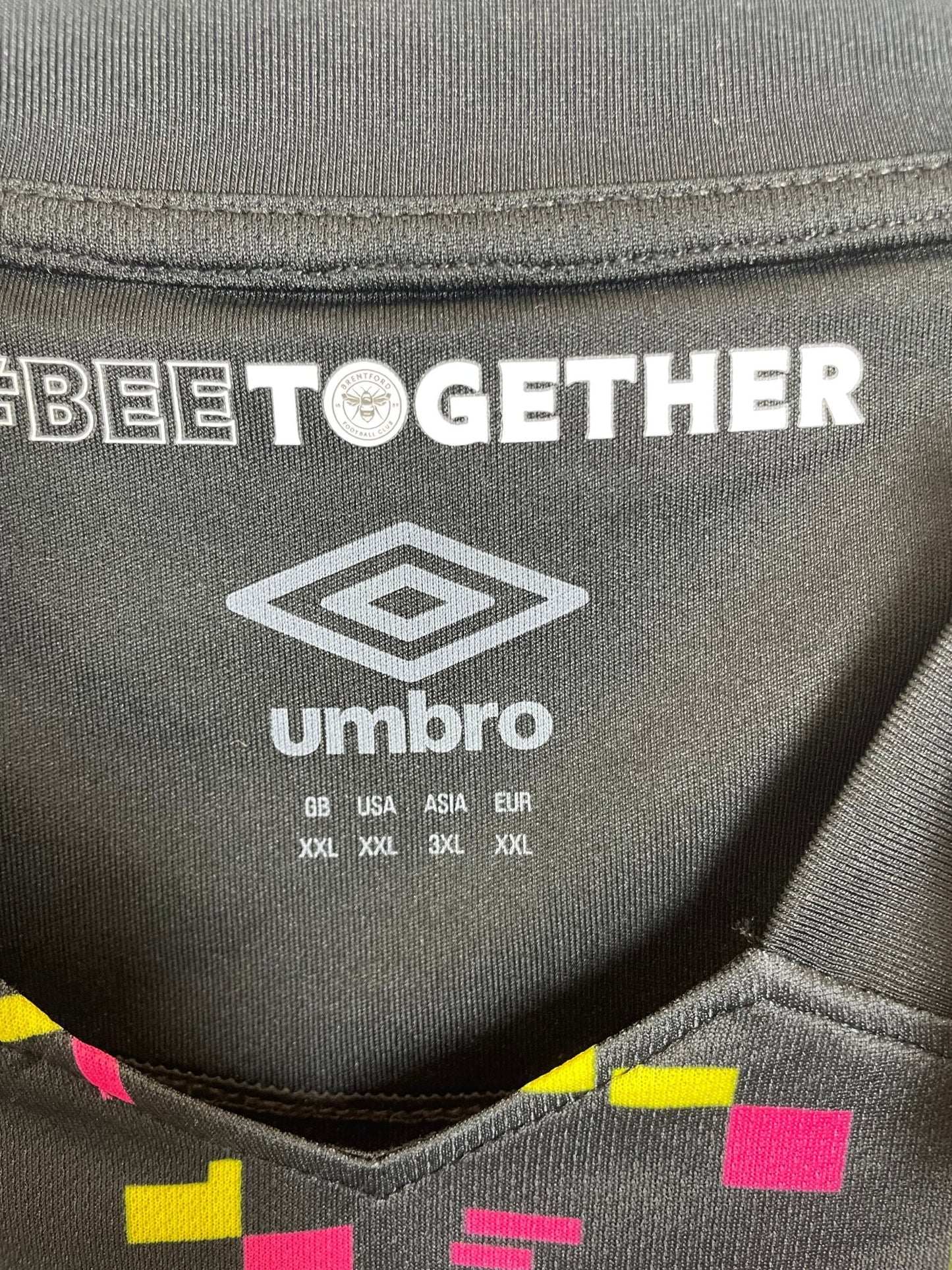 Back of the Umbro Brentford 2022/23 third shirt with the Ivan Toney number 17 print, photographed against a plain background