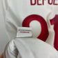 Close-up of the England national team crest on the 2012 white Umbro home shirt, photographed in detail for accurate grading