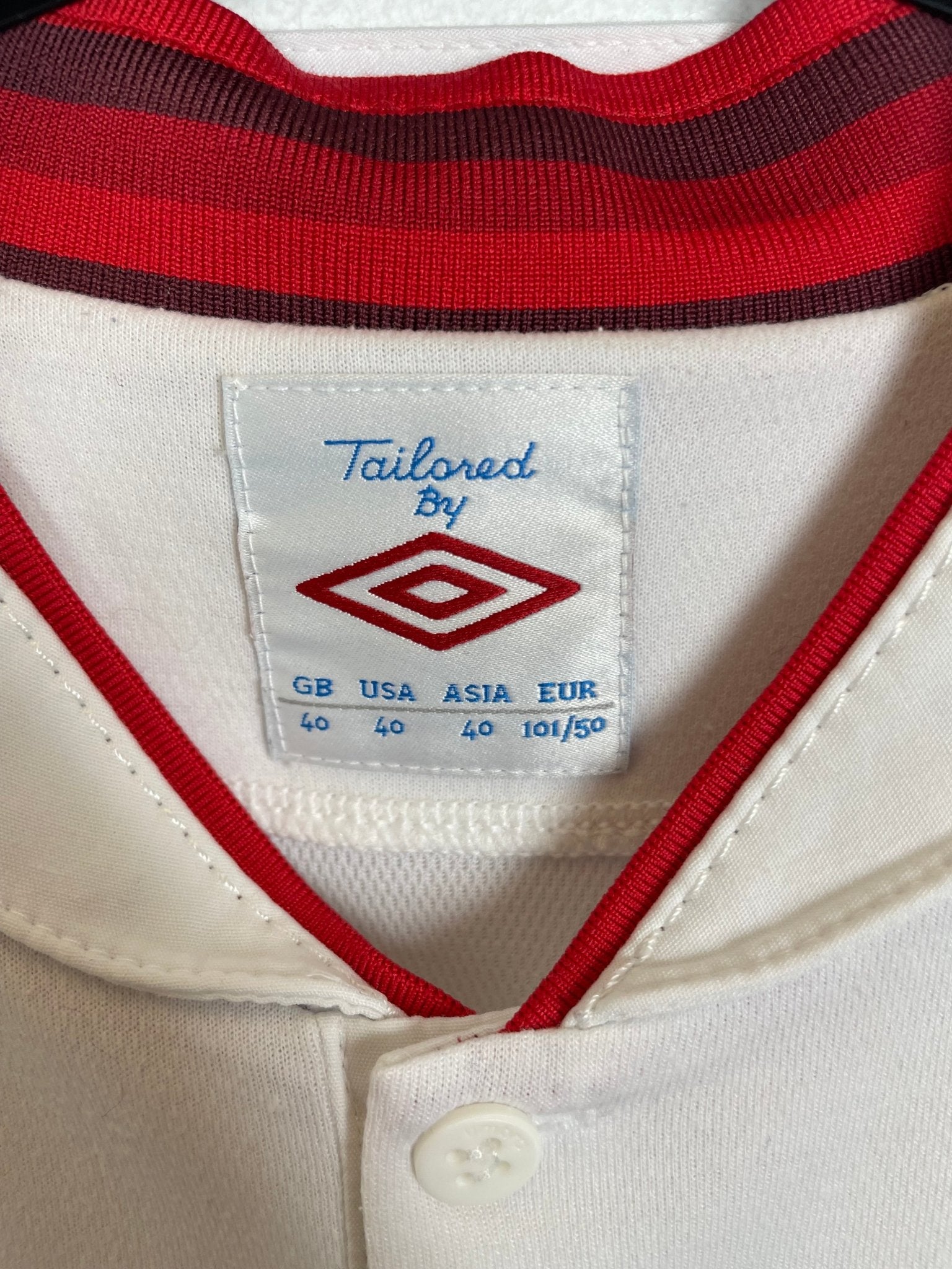 Back of the Umbro England 2012 white home shirt with the Jermain Defoe number 21 print, shown in full rear detail