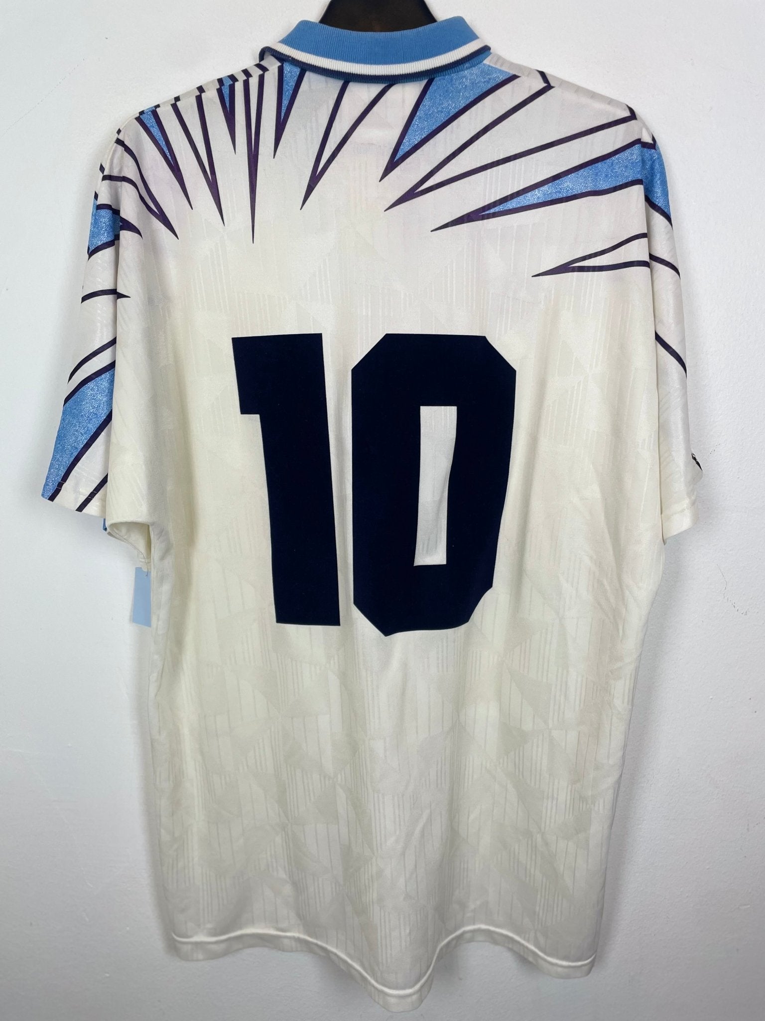 Front view of the retro Napoli 91/93 away shirt showing the badge and Umbro branding, photographed at our Stavanger store