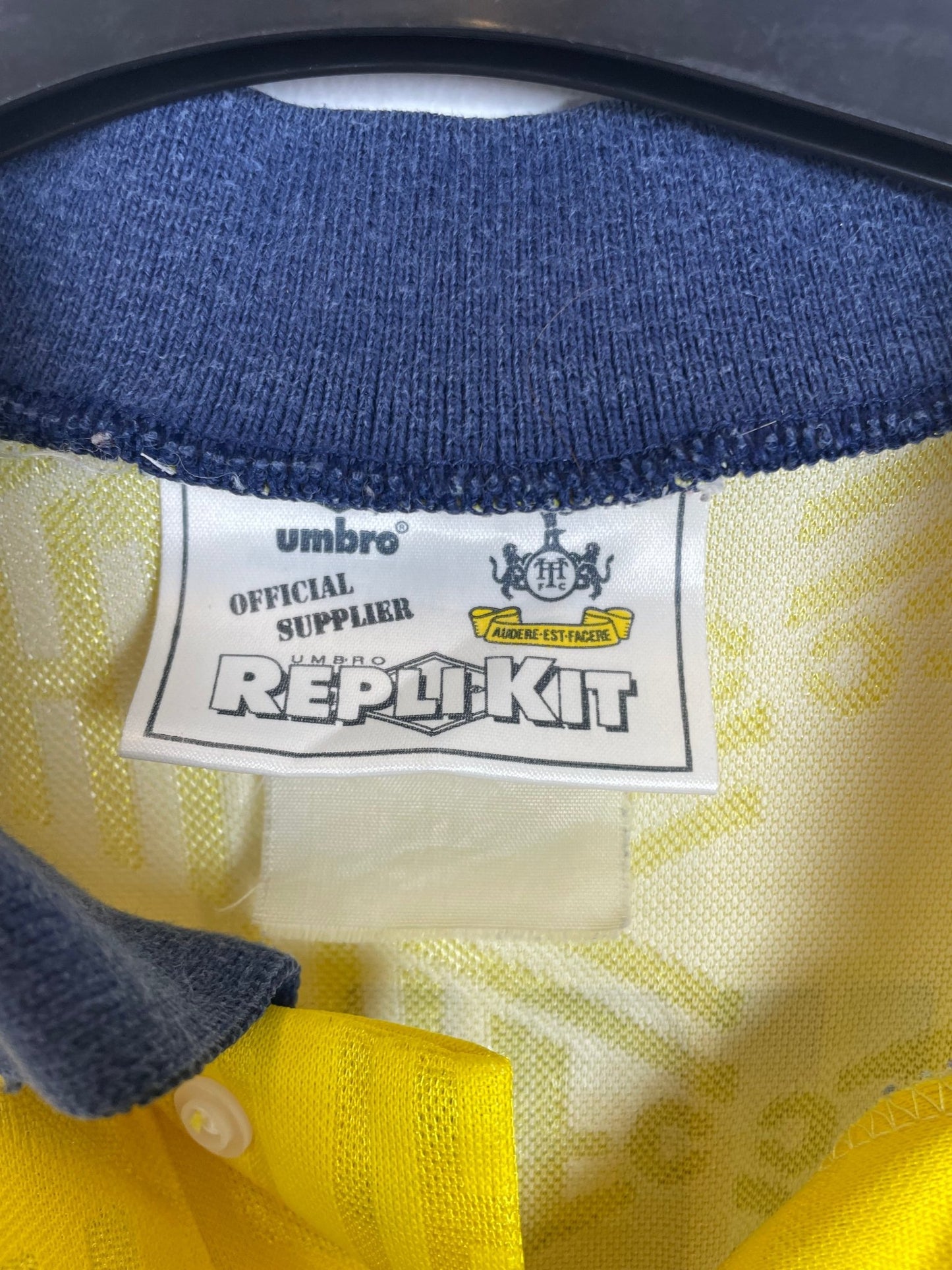 Back of the vintage Tottenham 1991-95 away shirt with the Jurgen Klinsmann number 18 print, shown in full rear detail