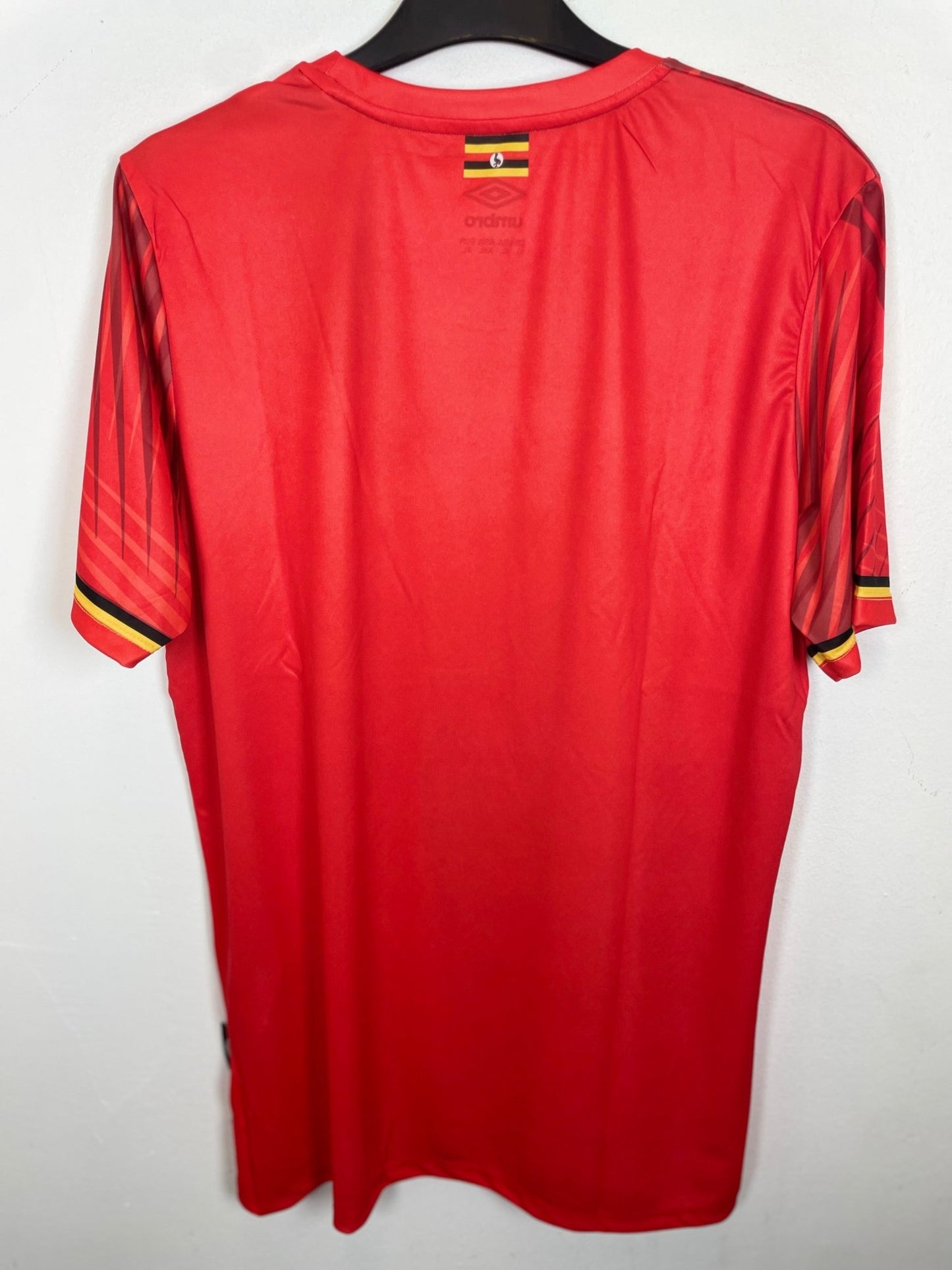 Front view of the Uganda 21/22 home shirt showing the Cranes badge and Umbro branding, photographed at our Stavanger store